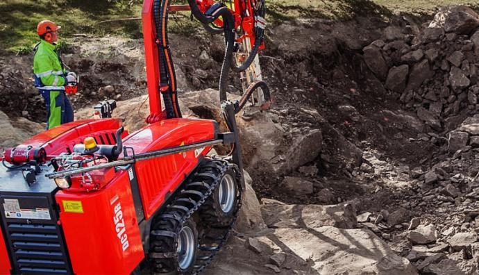 Red excavator Pentair | Seacon Logistics